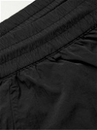 C.P. Company - Tapered Logo-Appliquéd Garment-Dyed Chrome-R Trousers - Black