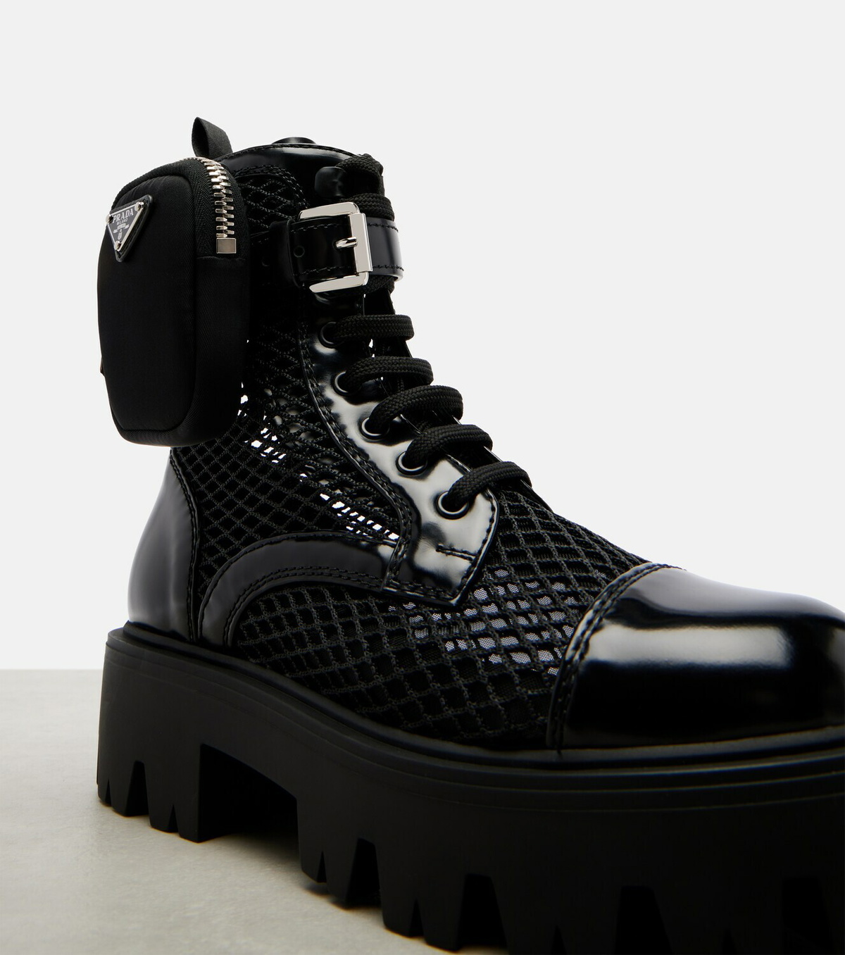 Prada Leather-trimmed mesh combat boots