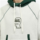 Brain Dead Men's Logo Head Raglan Hoodie in Oatmeal/Green