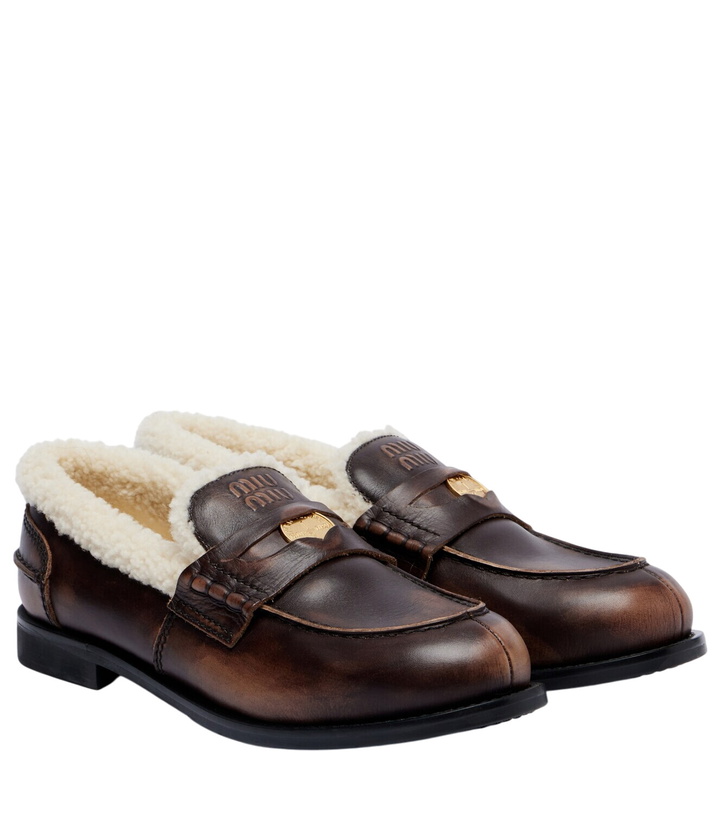 Photo: Miu Miu Shearling-lined leather penny loafers