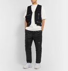 AMBUSH® - Tapered Logo-Print Quilted Coated-Cotton Track Pants - Black