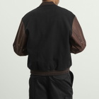 Represent Men's Vintage Varsity Jacket in Jet Black