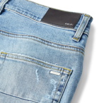 AMIRI - Skinny-Fit Distressed Panelled Stretch-Denim Jeans - Blue