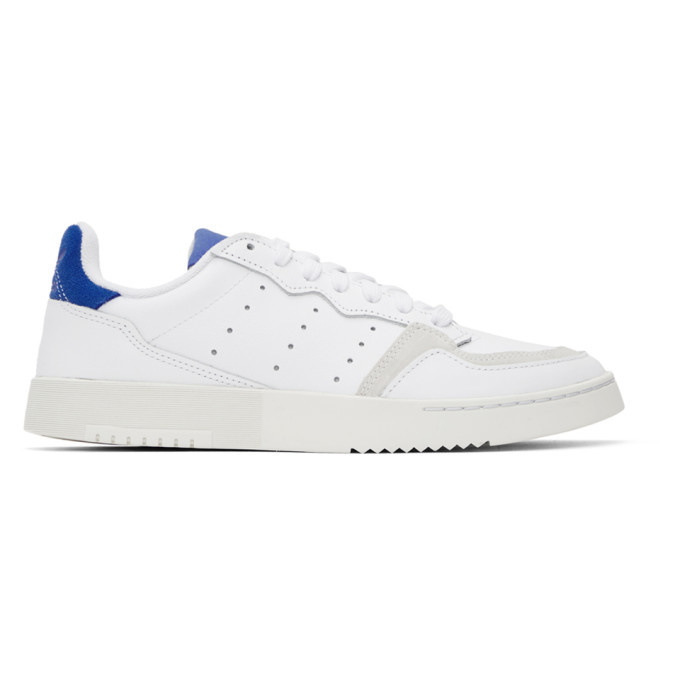 Photo: adidas Originals White and Blue Supercourt Sneakers