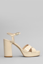Stuart Weitzman Dayna Platform Sandals In Beige Patent Leather