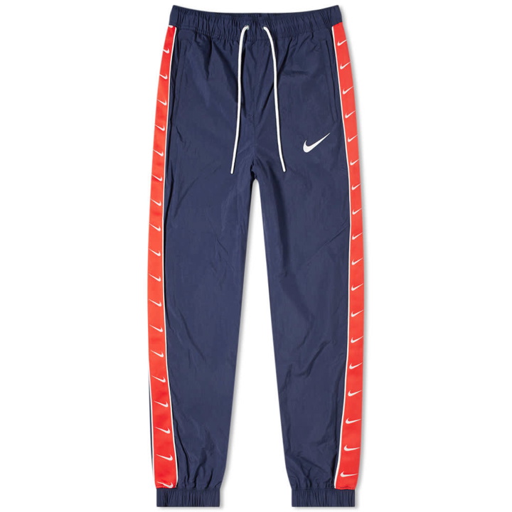 Photo: Nike Taped Swoosh Woven Pant