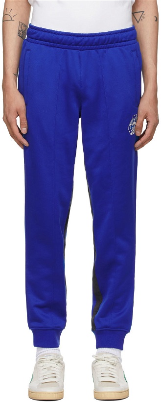 Photo: Rhude Blue Puma x Rhuigi Edition Logo Track Pants
