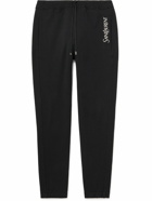 SAINT LAURENT - Tapered Logo-Embroidered Cotton-Jersey Sweatpants - Black