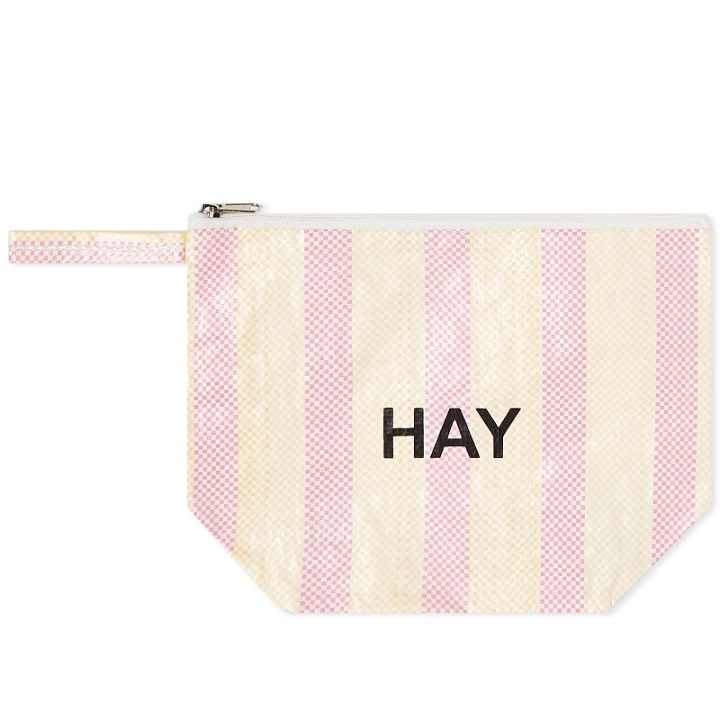 Photo: HAY Recycled Candy Stripe Wash Bag - Medium in Red/Yellow