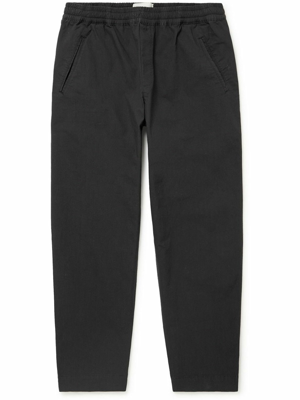 Photo: Folk - Assembly Tapered Pleated Stretch Organic Cotton-Ripstop Trousers - Black