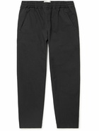 Folk - Assembly Tapered Pleated Stretch Organic Cotton-Ripstop Trousers - Black