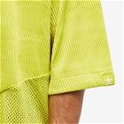 Adidas Men's x SFTM Short Sleeve Zip Shirt in Unity Lime