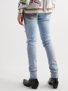 AMIRI - Skinny-Fit Panelled Distressed Jeans - Blue