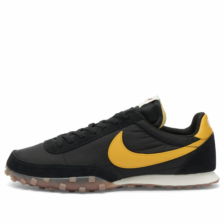Photo: Nike Men's Waffle Racer '26 Sneaker in Black/University Gold/Sail/Gum
