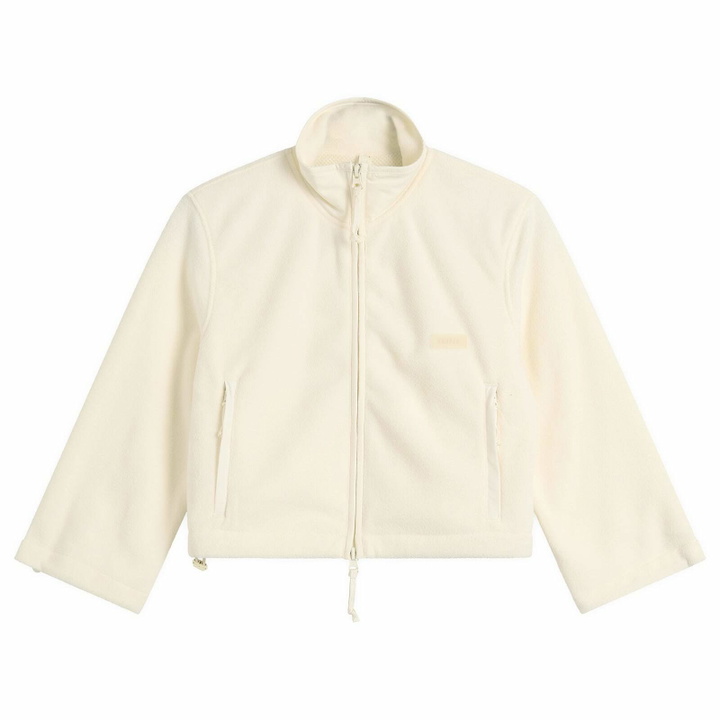 Photo: SKIMS Women's Fleece Lounge Shrunken Zip Up Jacket in Ecru