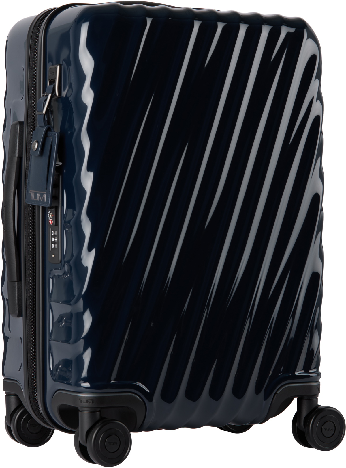 Tumi Navy International Expandable 4 Wheeled Carry-On Suitcase
