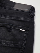 AMIRI - MX1 Skinny-Fit Panelled Distressed Jeans - Black