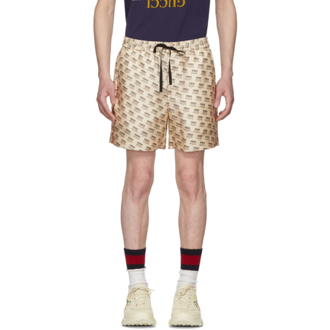 Photo: Gucci Ivory All Over Logo Stamp Shorts