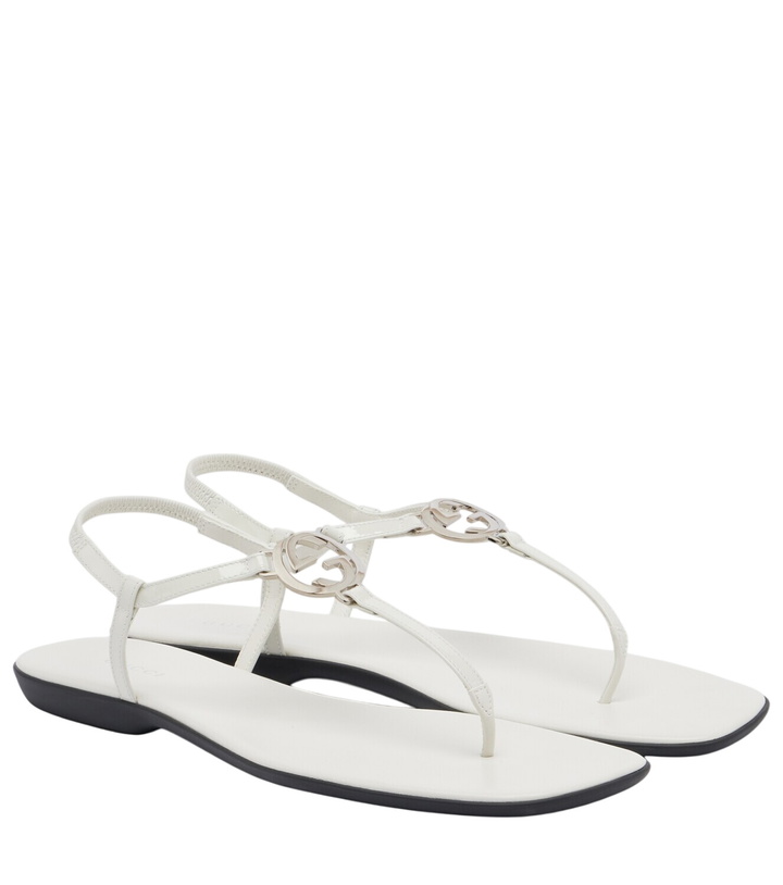 Photo: Gucci Interlocking G leather patent thong sandals