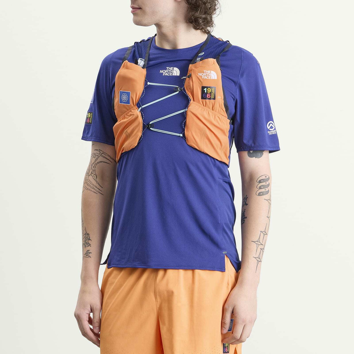 The North Face Men's Summit Run Expedition Vest 10 in Papaya/Bold Blue