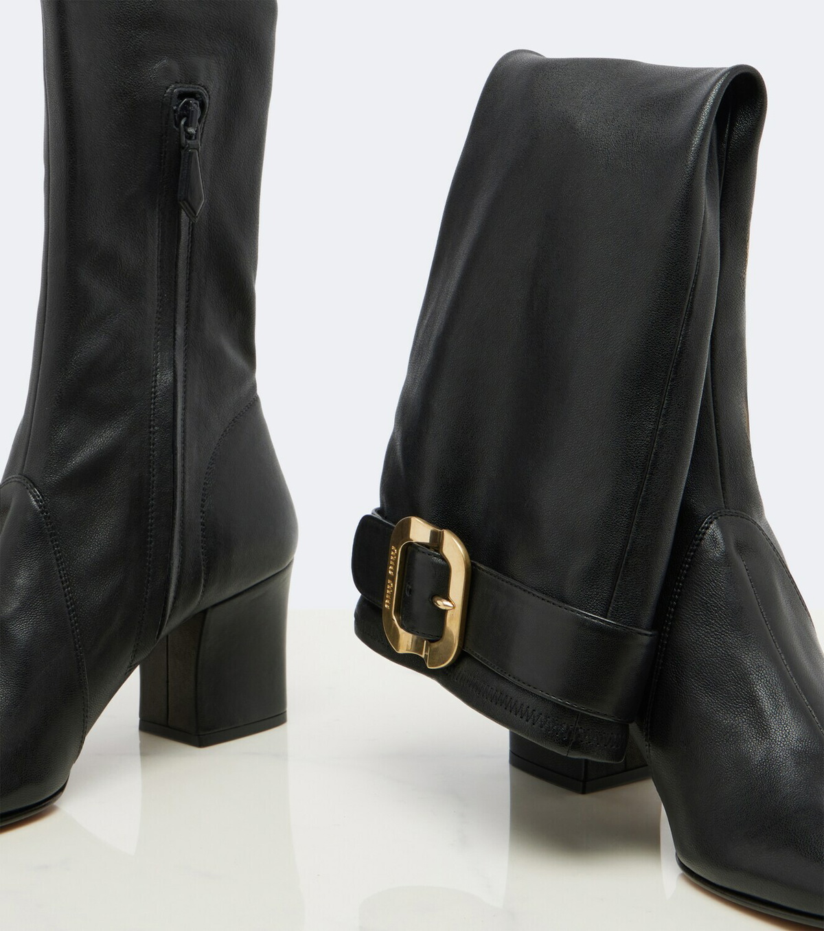 Miu Miu Leather knee-high boots
