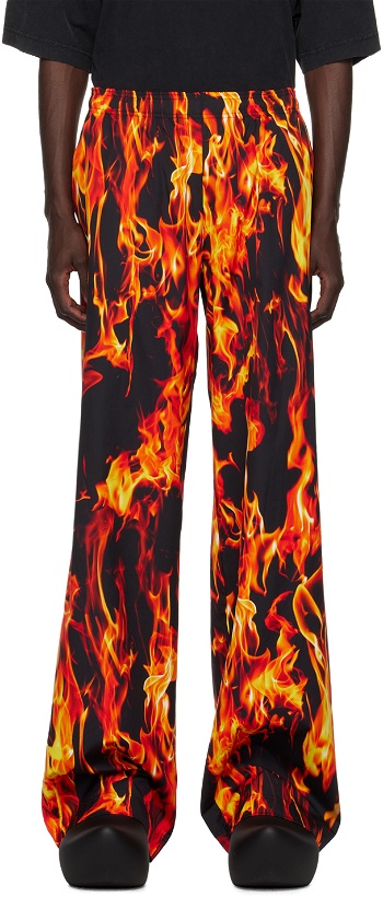 Photo: VETEMENTS Black & Orange Fire Sweatpants