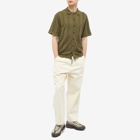 Pass~Port Men's Bath House Button Through Knitted Polo Shirt in Moss