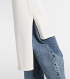 Alaïa Caped wool turtleneck top