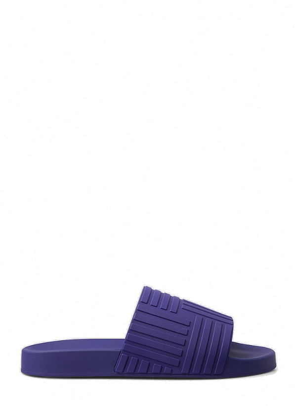 Photo: Embossed Rubber Slides in Purple