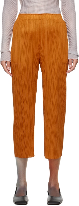 Photo: PLEATS PLEASE ISSEY MIYAKE Orange Monthly Colors April Trousers
