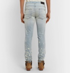 AMIRI - Thrasher Minus Skinny-Fit Paint-Splattered Distressed Stretch-Denim Jeans - Blue