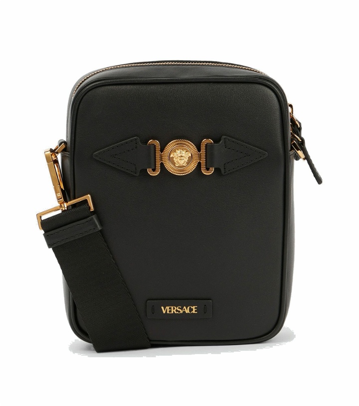 Photo: Versace - Medusa embellished leather crossbody bag