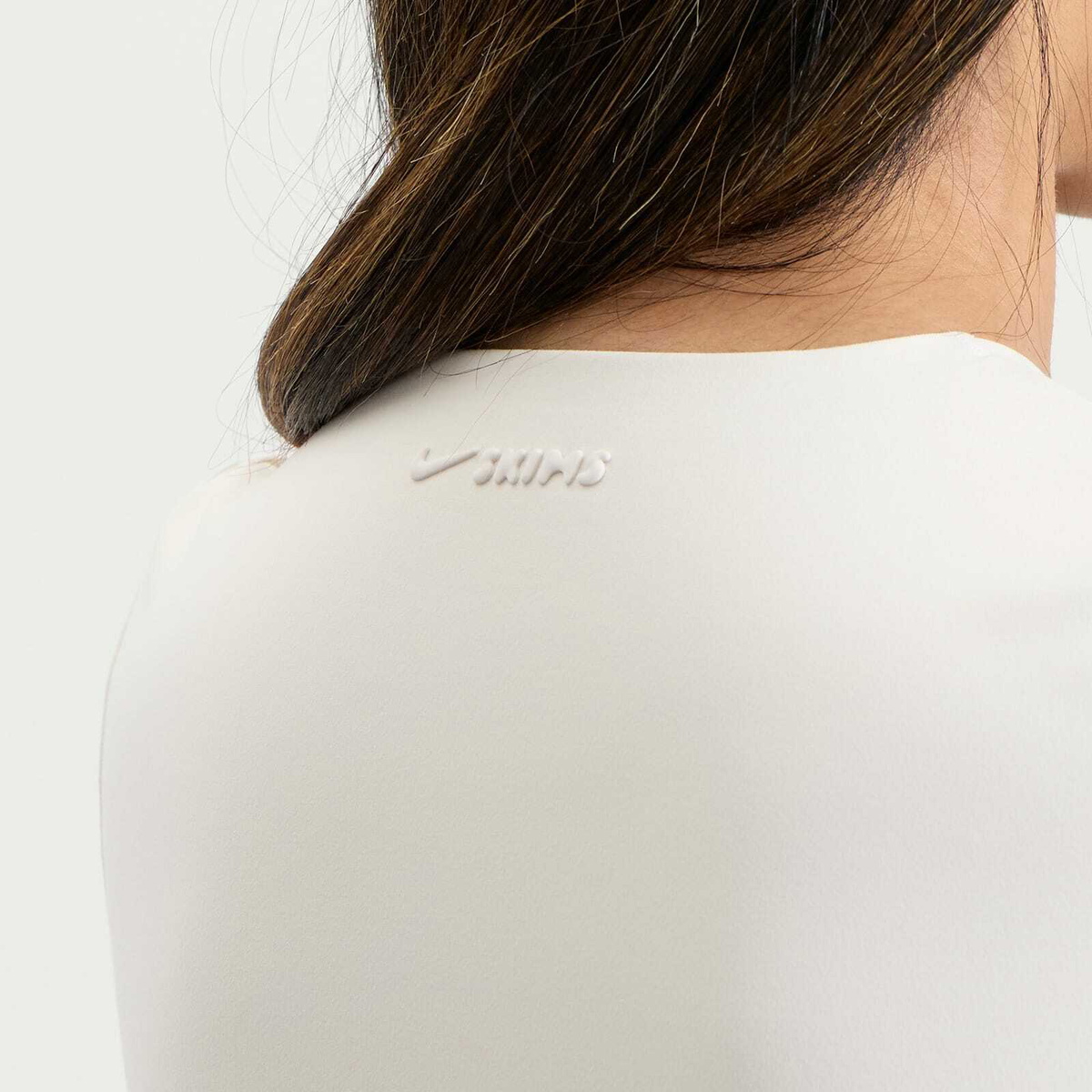 Nike Women's x SKIMS Matte Corset Short Sleeve Crop Top in Ivory