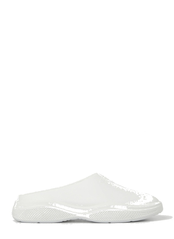 Photo: Logo Embossed Foam Mules in White