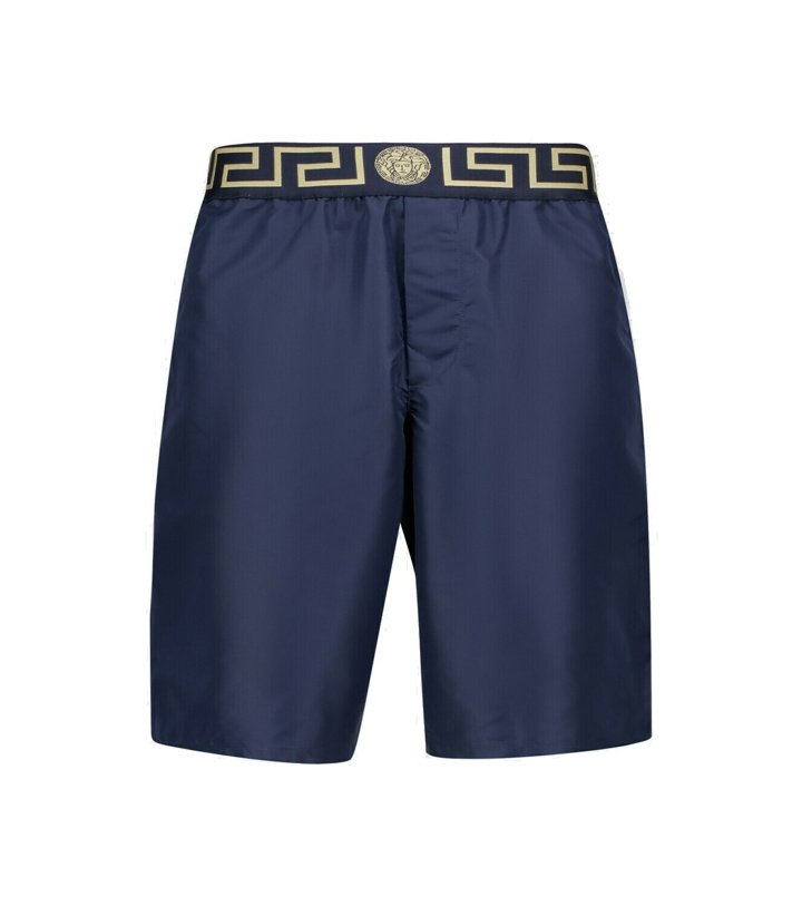 Photo: Versace - Greca border swim shorts