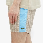 Lacoste Men's Monogram Swim Shorts in Croissant/Bonnie
