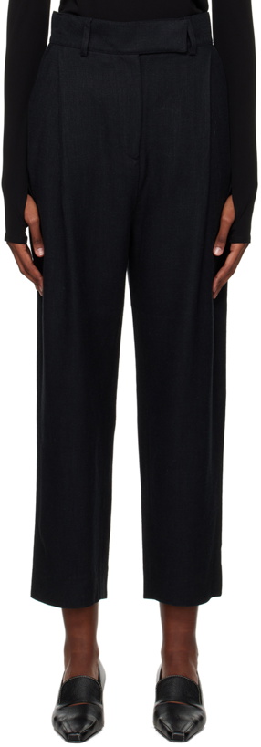 Photo: Totême Black Deep Pleat Trousers