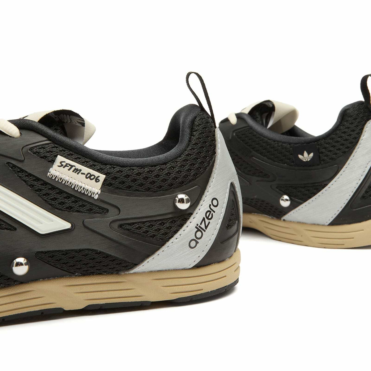 Adidas x SFTM Adizero Sneaker in Core Black/Cream White/Silver
