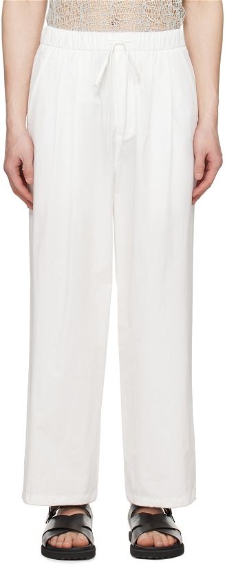 Photo: AMOMENTO White Pleated Trousers