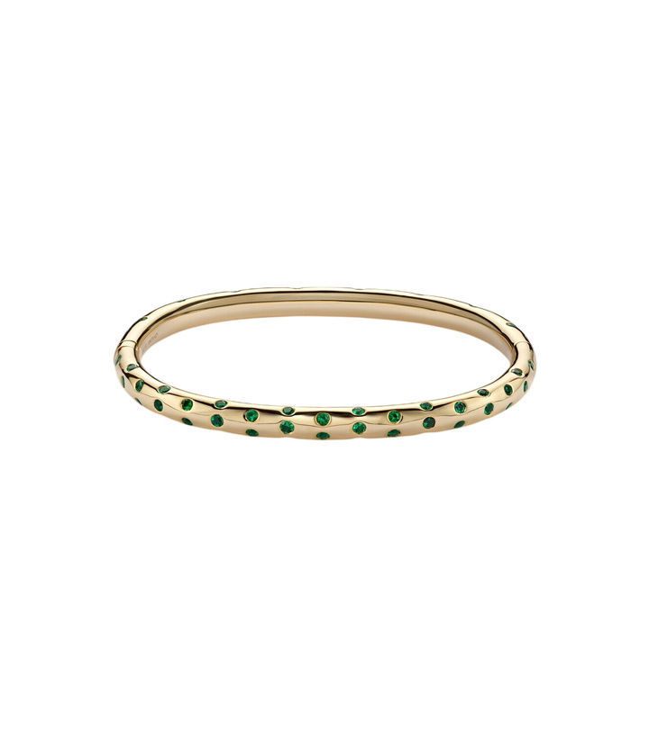 Photo: Anita Ko Cosmo Orion 18kt gold bangle with emeralds