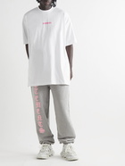 VETEMENTS - Tapered Logo-Print Cotton-Blend Jersey Sweatpants - Gray