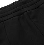 Moncler - Tapered Logo-Appliquéd Loopback Cotton-Jersey Sweatpants - Black