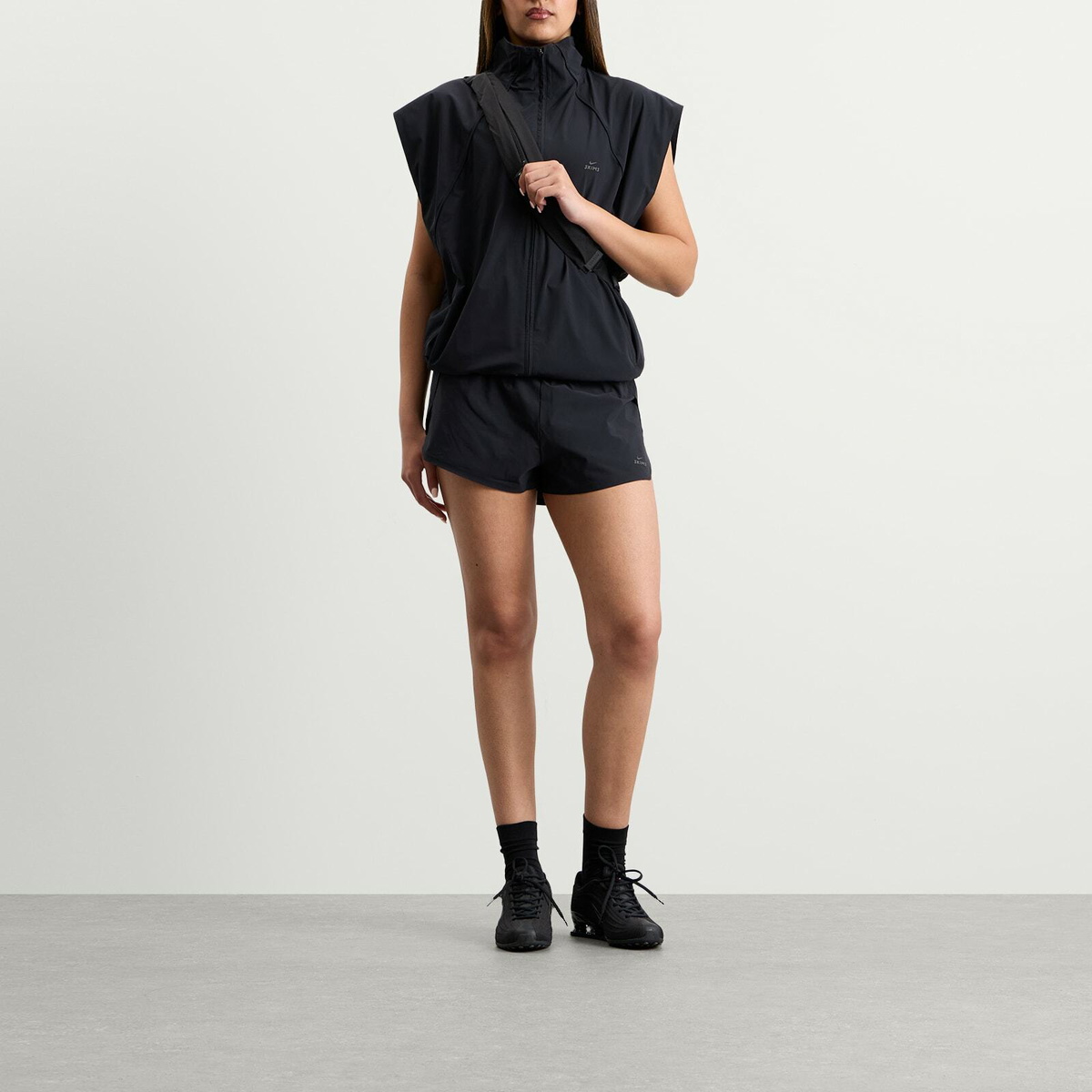 Nike Women's x SKIMS Stretch Nylon Runner Short in Obsidian