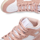 Air Jordan 1 Mid SE GS Sneakers in White/Legend Pink/Sail