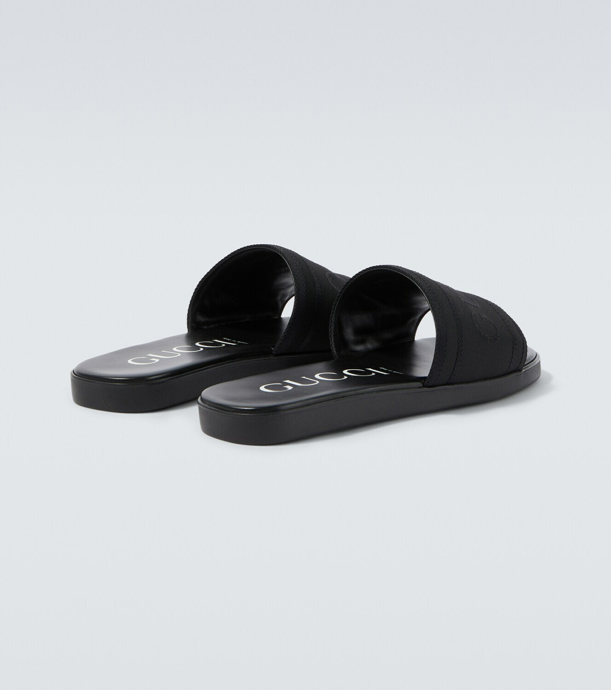 Gucci Logo canvas and leather slides