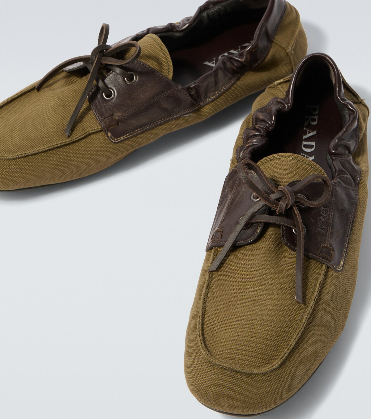 Prada Shuffle leather-trimmed canvas boat shoes