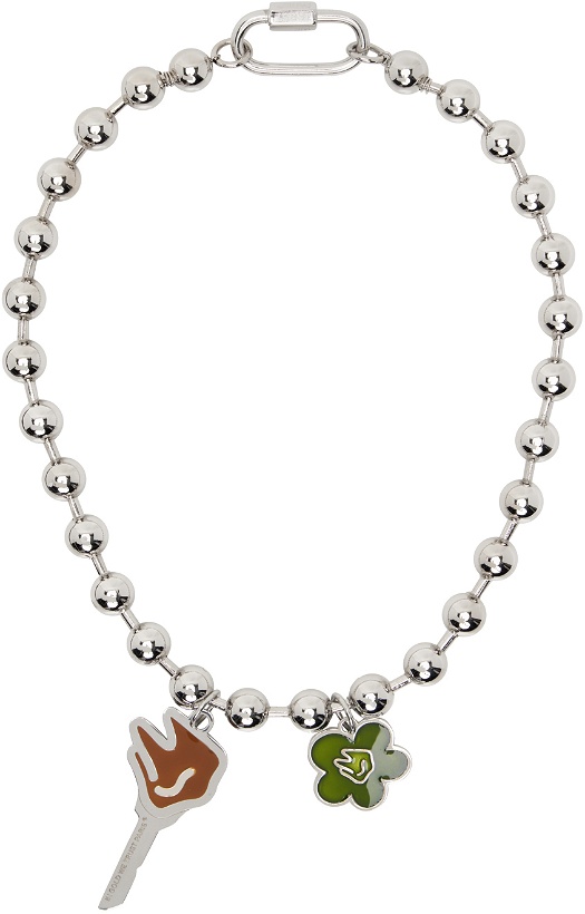 Photo: IN GOLD WE TRUST PARIS Silver Flower & Key Necklace