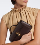 Savette Symmetry Pochette Small leather top-handle bag
