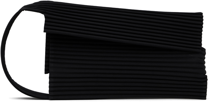 Photo: HOMME PLISSÉ ISSEY MIYAKE Black Overlap Bag
