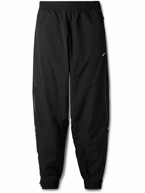 Photo: Nike - Solo Swoosh Tapered Logo-Embroidered Taffeta Track Pants - Black
